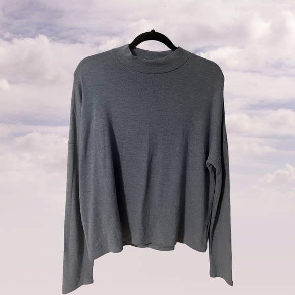 twik Sweaters - A Twik top in blue and a size large